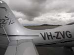 173.VH-ZVG, SR-22-G2-R9 at Albany, WA Terminal, looking NE towards approaching WX